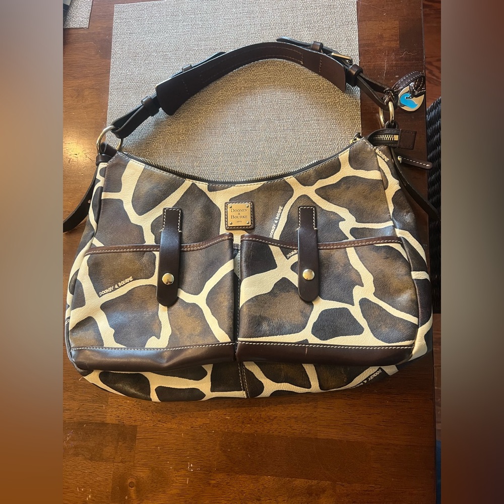 Authentic Dooney & Bourke Hobo leather bag.‎   Y2K era early 2000’s animal print